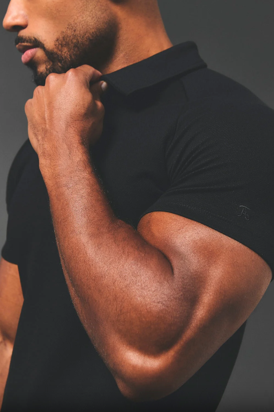 QUARTER ZIP POLO IN BLACK